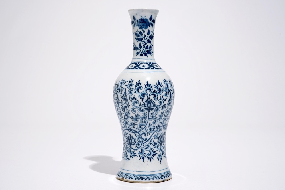 A Dutch Delft blue and white vase with peony scrolls in Ming-style, late 17th C.