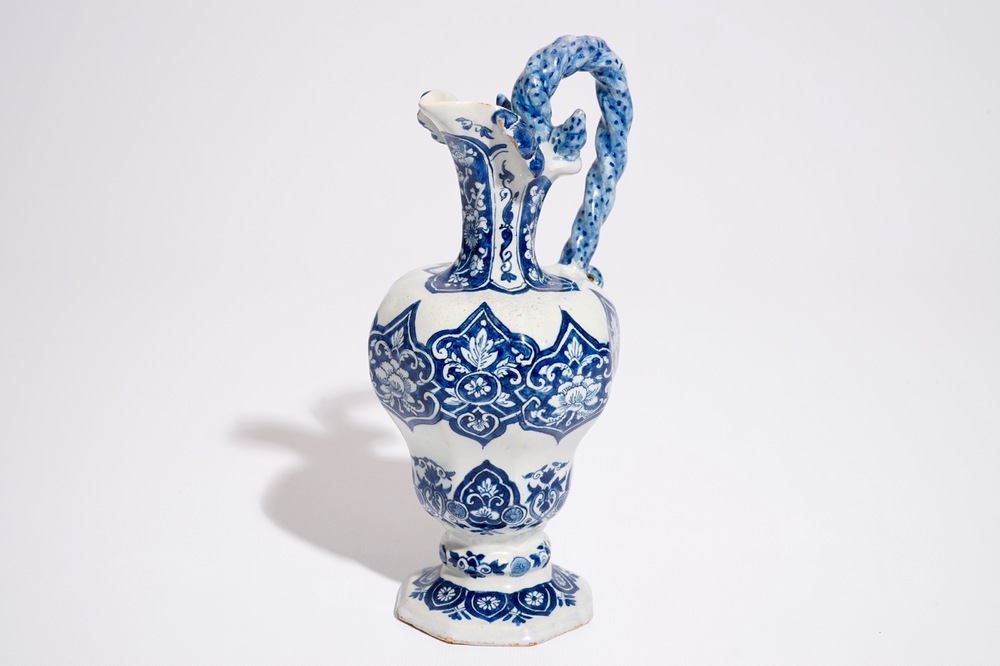 A Dutch Delft blue and white rope twist handle jug, late 17th C.