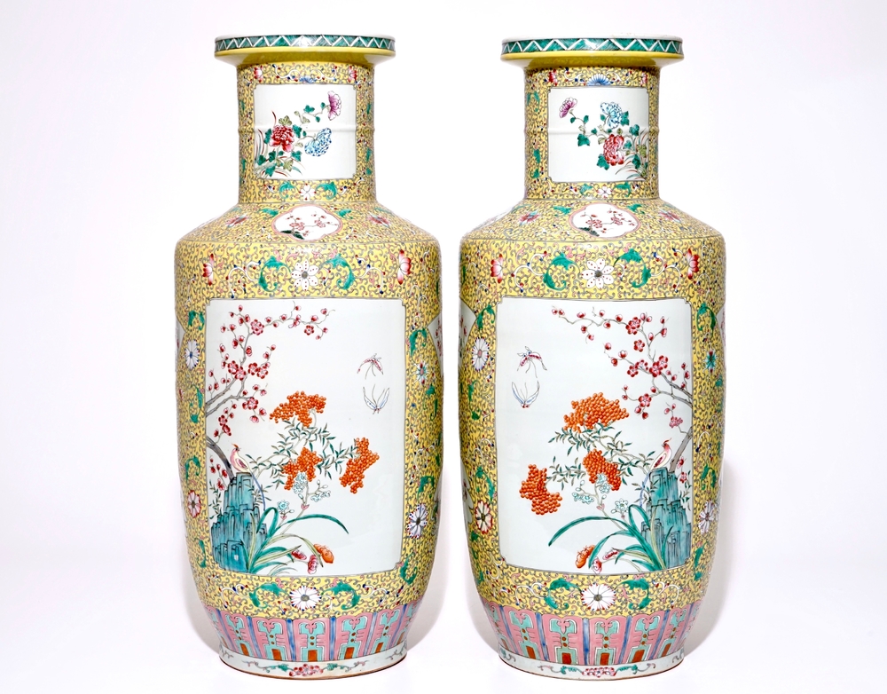A pair of large Chinese yellow ground famille rose vases, 19/20th C.