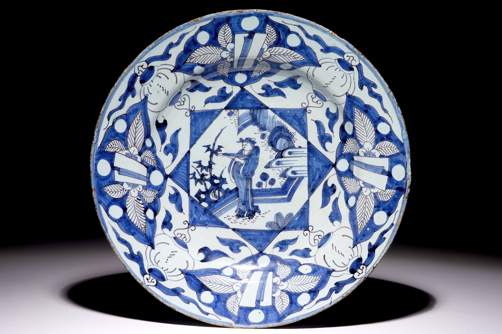 A Dutch Delft blue, white and manganese chinoiserie dish, 17th C.