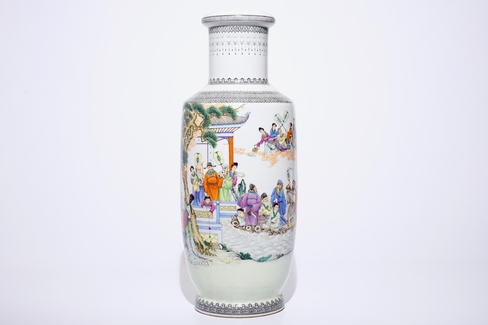 A large Chinese famille rose rouleau vase with figures in a garden, 20th C.