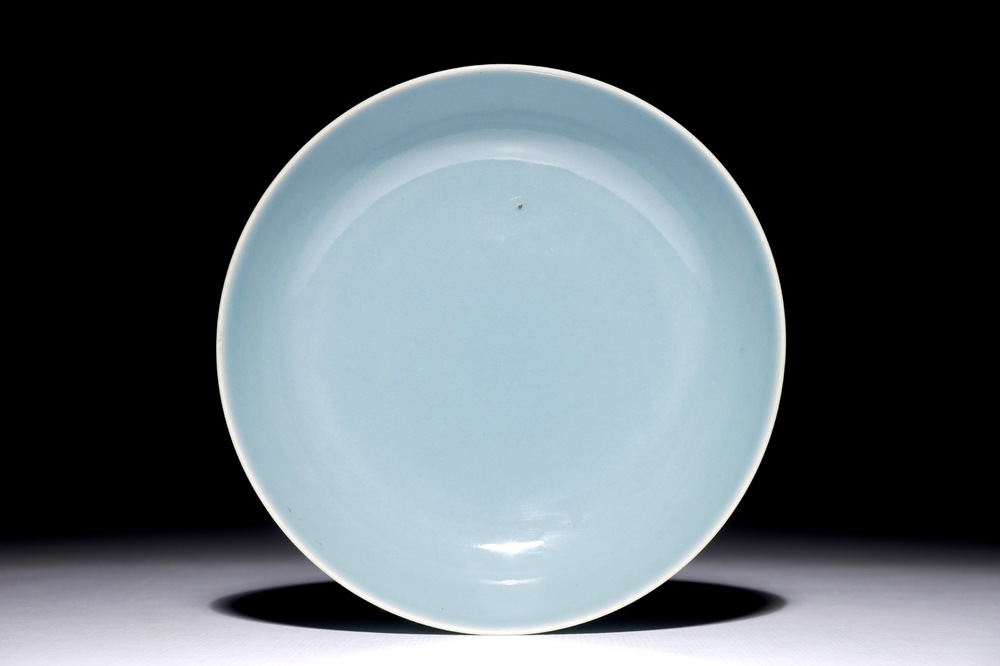 A monochrome Chinese clair-de-lune glazed saucer dish, Qianlong mark, 19/20th C.