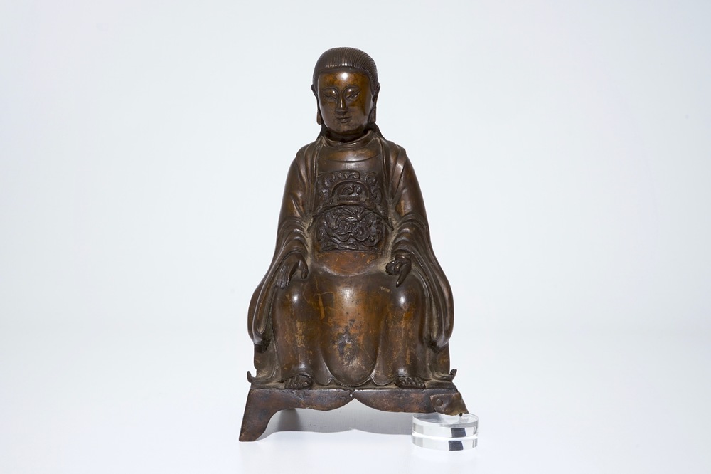 A Chinese bronze model of a seated Zhenwu, Ming