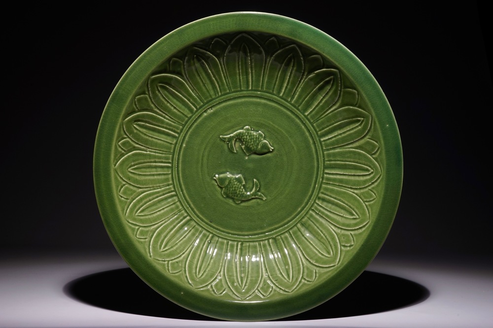 A large Chinese dark green celadon &ldquo;Twin fish&rdquo; dish, 20th C.