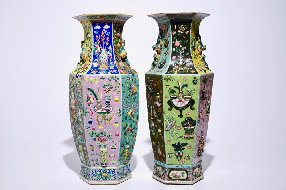 Two Chinese famille rose hexagonal relief-decorated vases, 19th C.