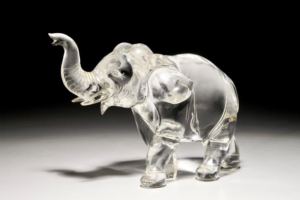 A Chinese carved rock crystal figure of an elephant, signed, 19/20th C.