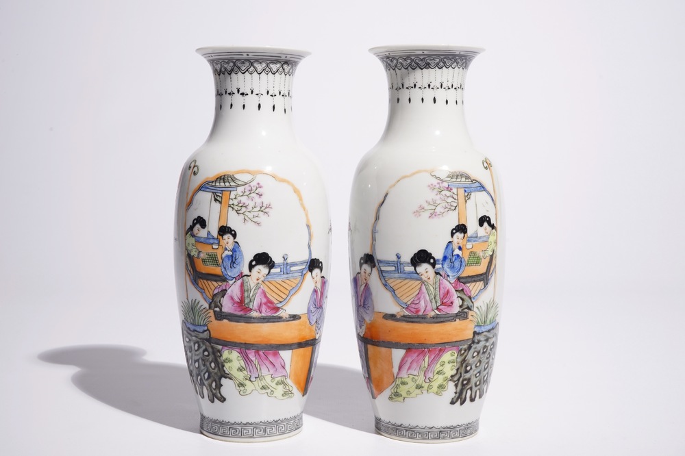 A pair of Chinese famille rose vases with ladies playing a qin and a game of go, Republic, 20th C.