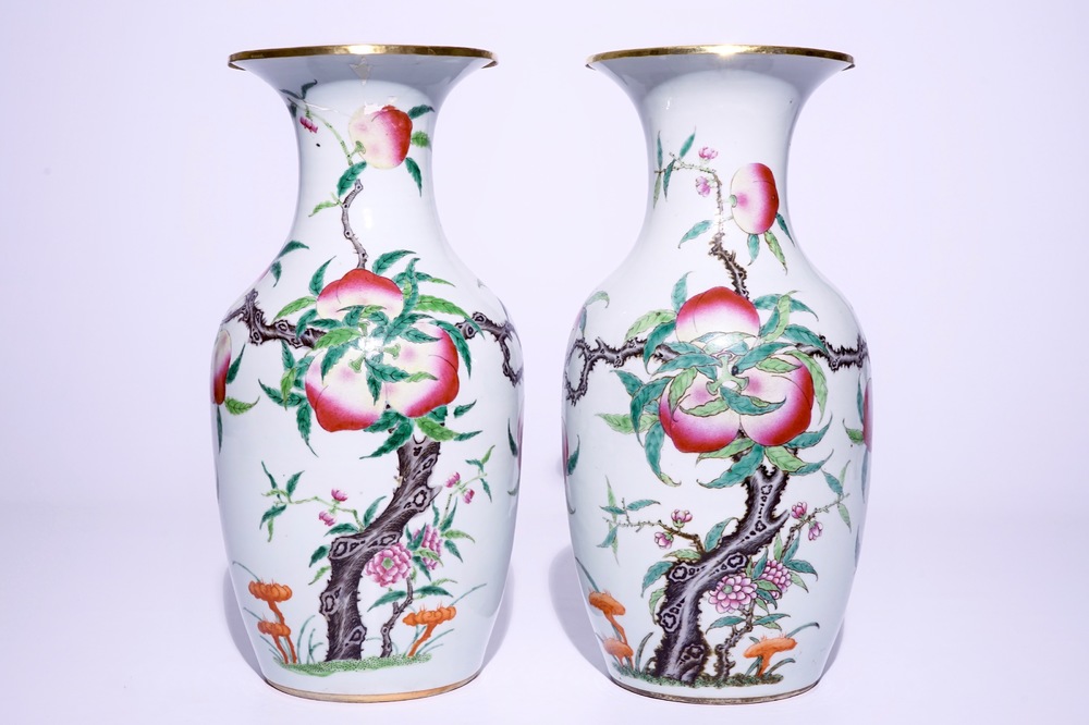 A pair of Chinese famille rose &quot;nine peaches&quot; vases, 19th C.