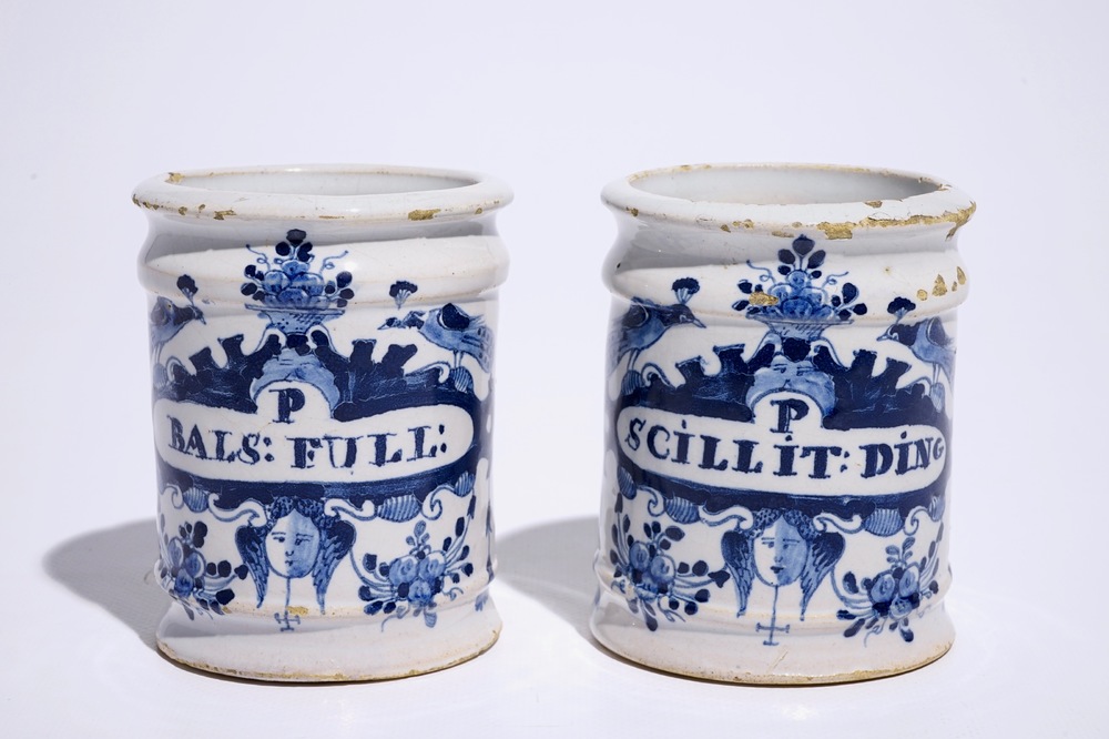 A pair of small Dutch Delft blue and white albarello-shaped pharmacy drug jars, 18th C.
