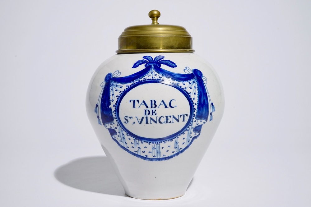 A blue and white Brussels faience tobacco jar with brass cover, 18th C.