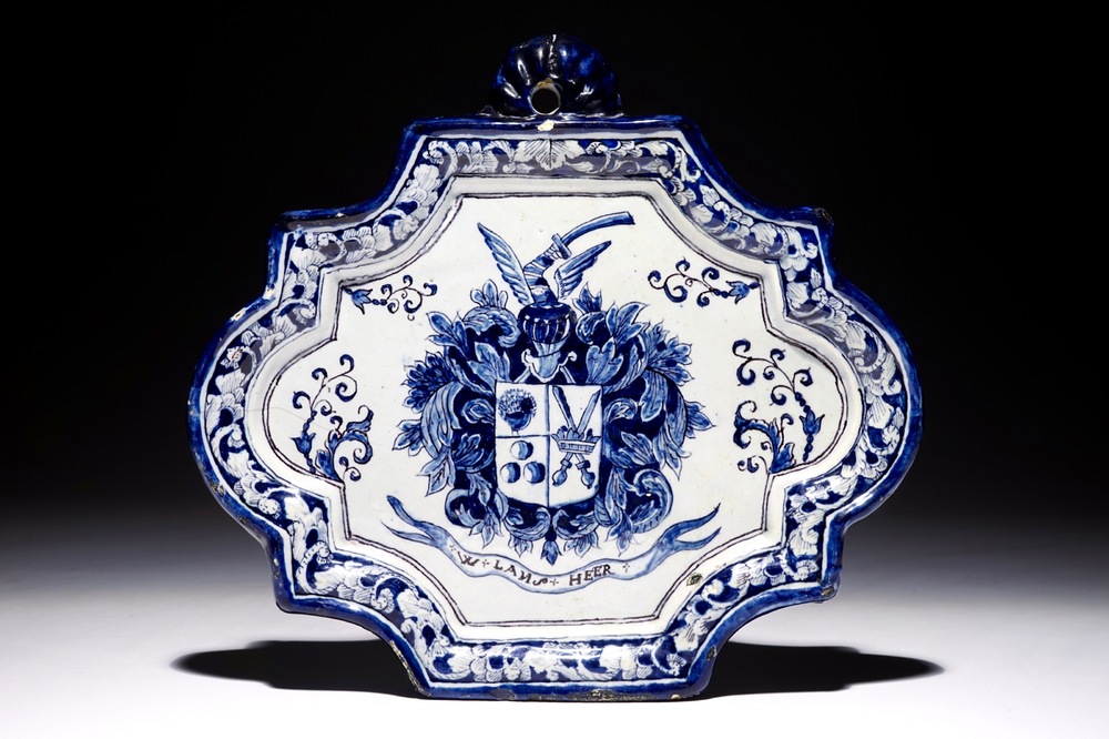 A Dutch Delft blue and white armorial plaque inscribed &quot;W. Lansheer&quot;, 1st half 18th C.