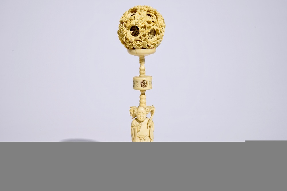 A Chinese carved ivory puzzle ball on stand, Canton, 19th C.