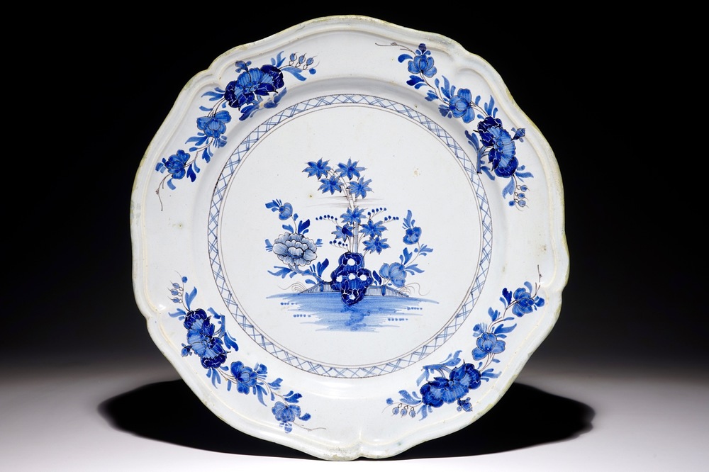 A large French faience Delft style dish, Saint Amand, 18th C.