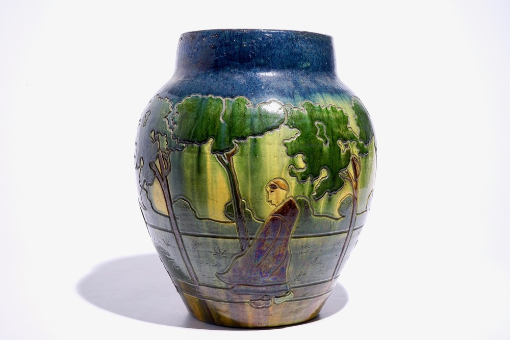 A large Flemish pottery vase with figures below trees, prob. Laigneil, Kortrijk, early 20th C.