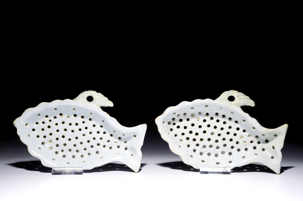 A pair of white Dutch Delft fish-shaped strainers, 18th C.