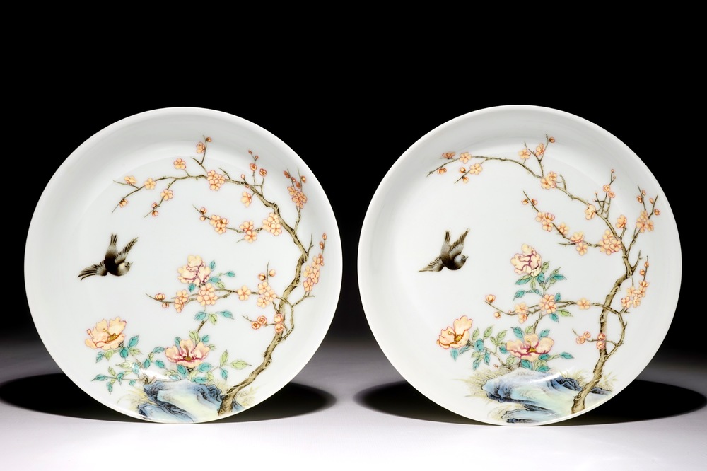 A pair of Chinese famille rose plates with a bird approaching a blossoming branch, Yongzheng mark, 20th C.