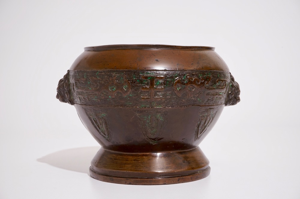 A Chinese bronze alms bowl, Xuande mark, 19/20th C.