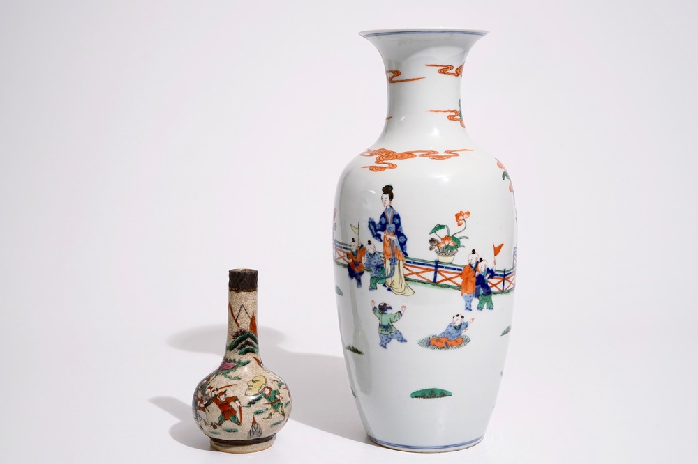 A Chinese doucai vase, Kangxi mark, with a Nanking famille rose crackle glaze vase, 19/20th C.