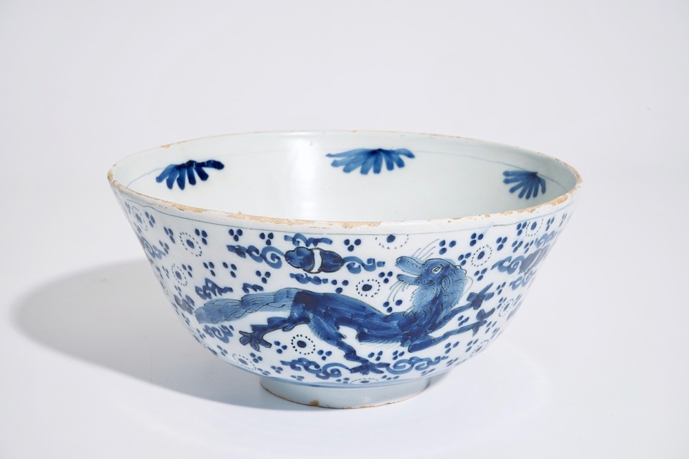 A Dutch Delft blue and white chinoiserie bowl with dragons, late 17th C.