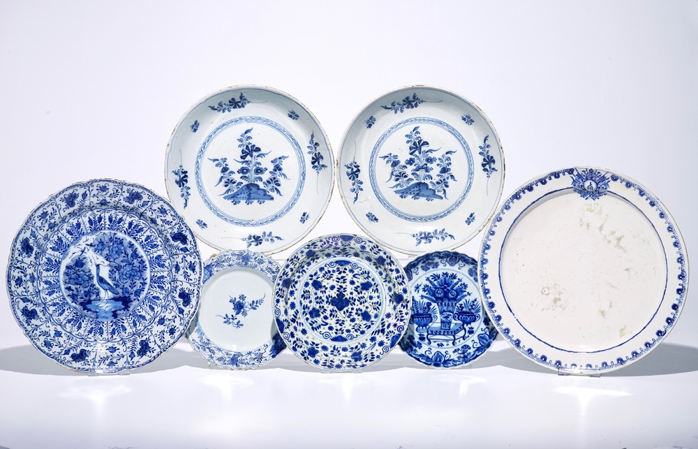 Seven various Dutch Delft and French faience blue and white dishes, 18th C.