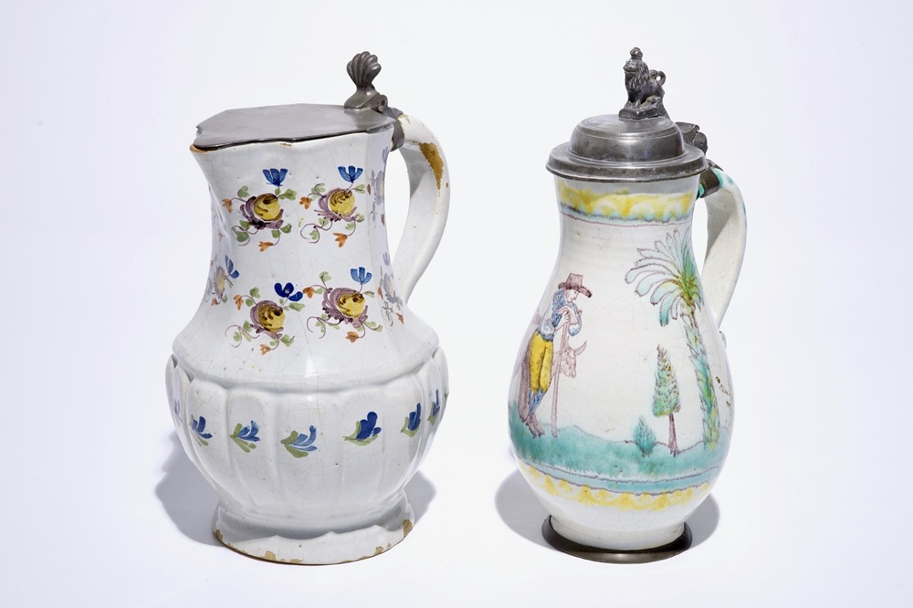 Two polychrome pewter-mounted faience jugs, North of France and Austria, 18th C.