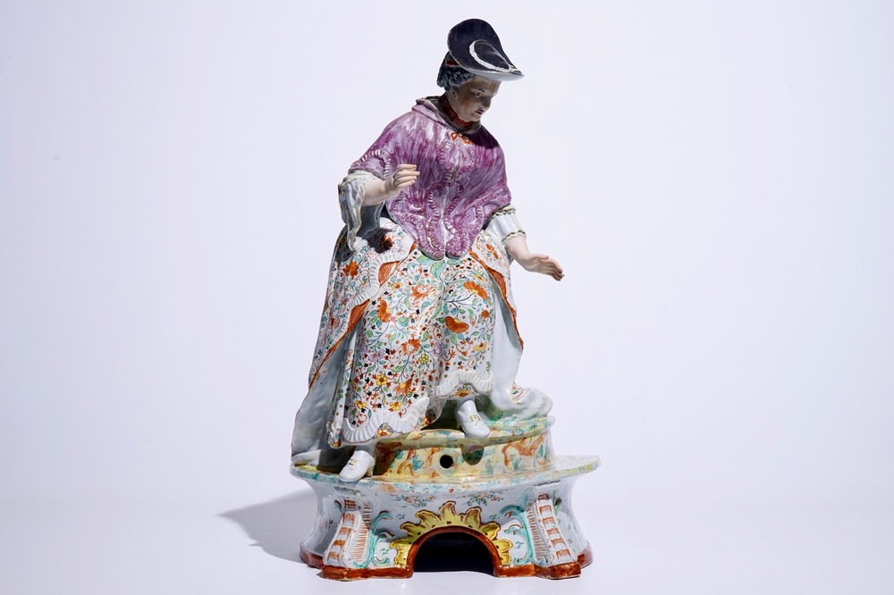 A massive Dutch Delft polychrome petit feu fountain in the shape of a lady, 18th C.