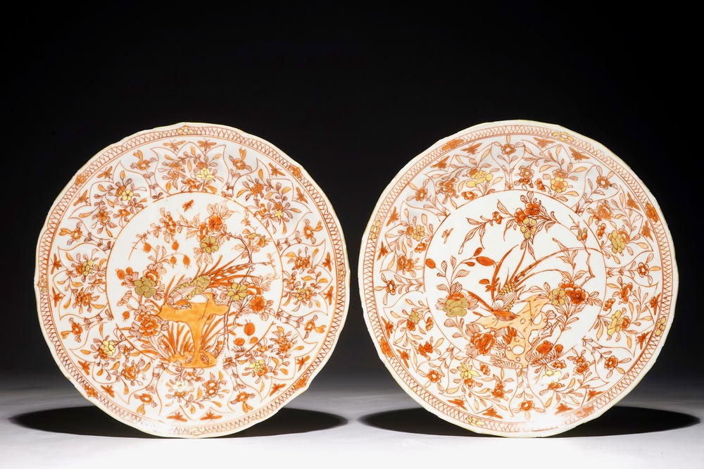 A pair of moulded Chinese iron red and gilt plates with pheasants, Kangxi