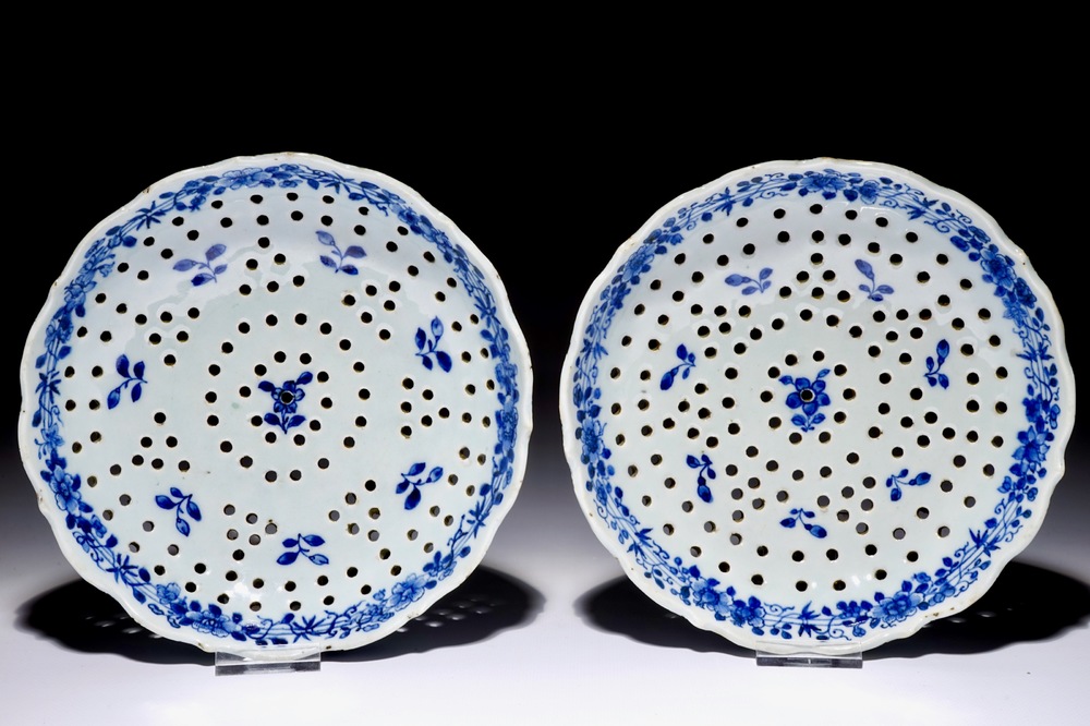 A pair of blue and white Chinese porcelain strainers after Delft examples, Qianlong