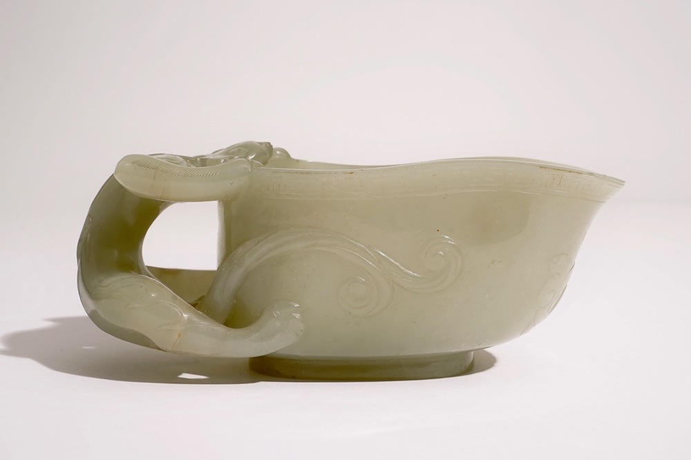 A Chinese pale celadon jade libation cup, 19th C.