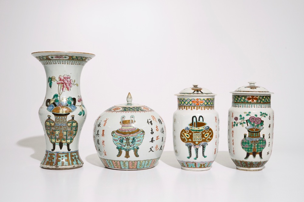 A set of matching Chinese famille verte vases and covers, 19th C