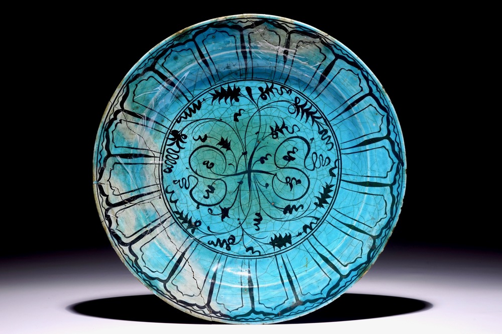 An Islamic turquoise and black Kubachi dish, Iran, 17th C.