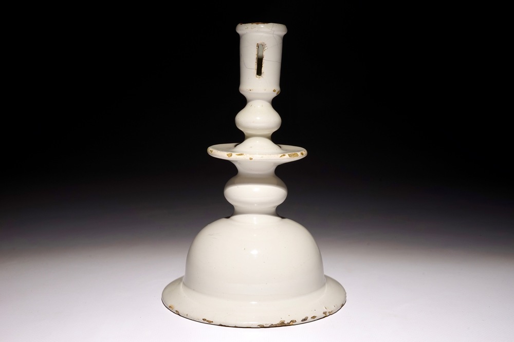 A rare large white Dutch Delft candlestick, 17th C.