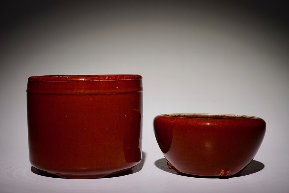 A Chinese monochrome sang-de-boeuf-glazed brush pot and a bowl, 19th C.