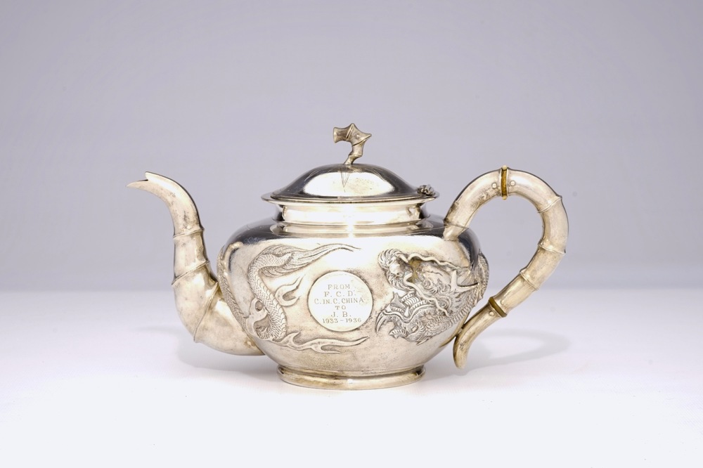 An inscribed Chinese silver teapot with dragon design, ca. 1936