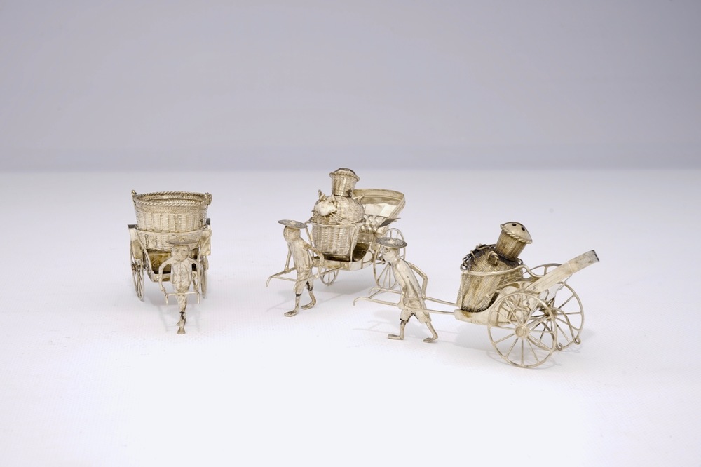 A Chinese silver rickshaw-shaped pepper and salt shaker and a mustard container, 19th C.