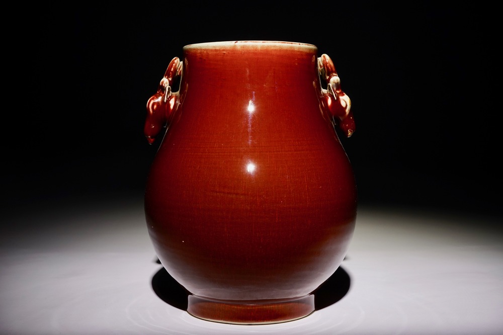 A Chinese monochrome sang-de-boeuf-glazed deer-handled hu vase, 19th C.