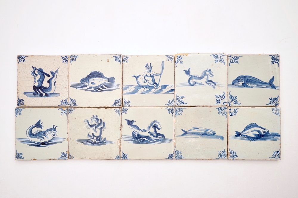 Ten Dutch Delft blue and white seacreature tiles, 17th C.