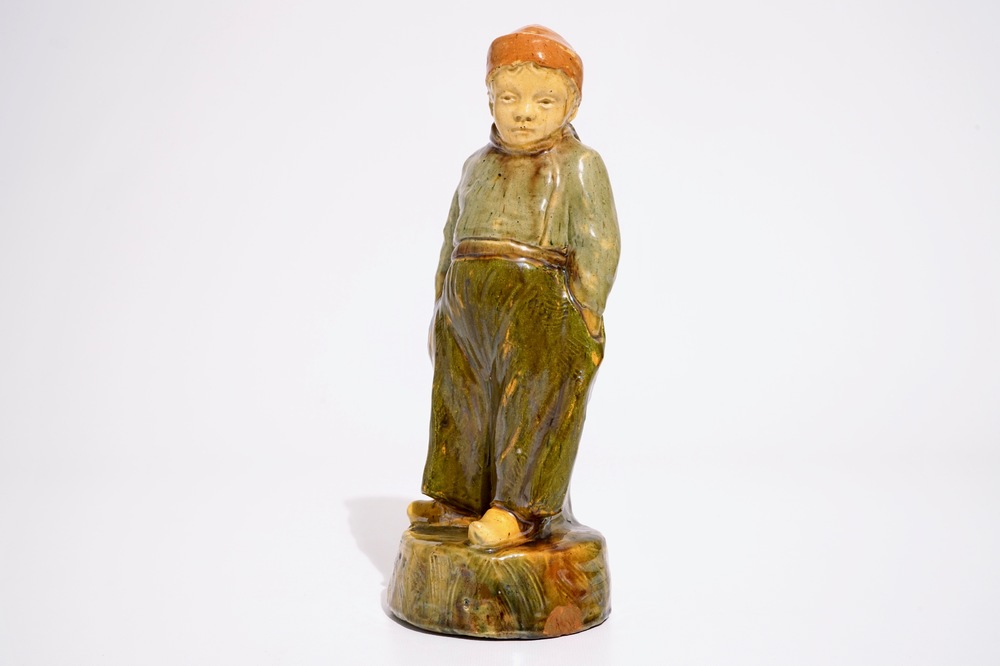 A Flemish pottery figure, &quot;The little farmer&quot;, prob. Laigneil workshop, 20th C.