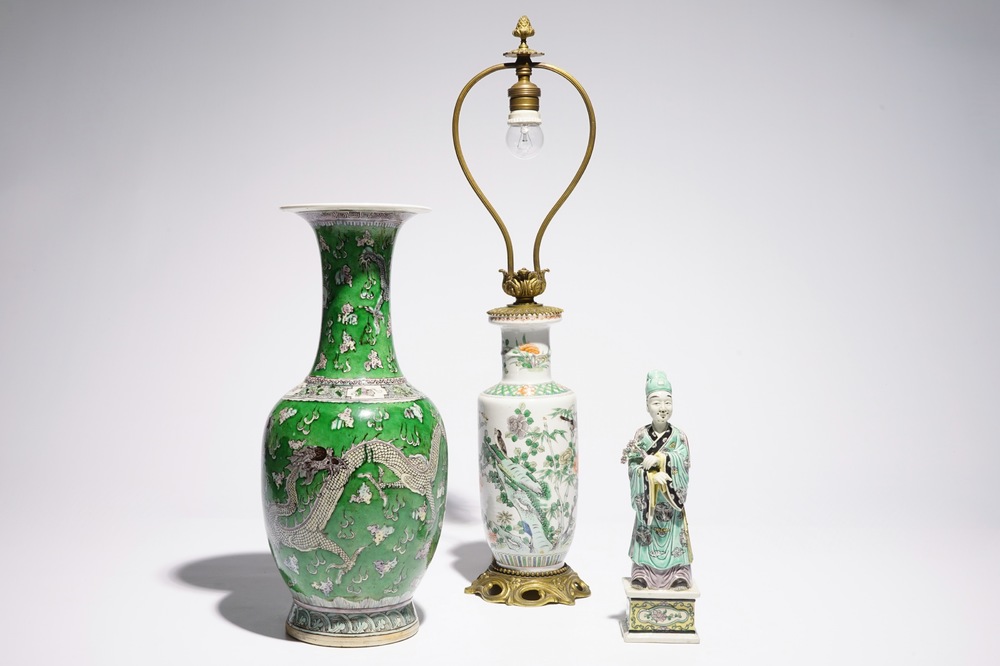 A Chinese green ground dragon vase, a small rouleau vase and a verte biscuit figure, 19th C.