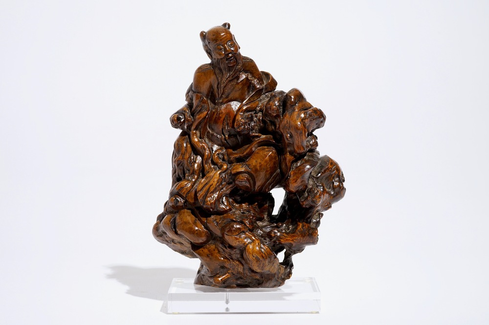 A Chinese carved root wood immortal group, 17/18th C.