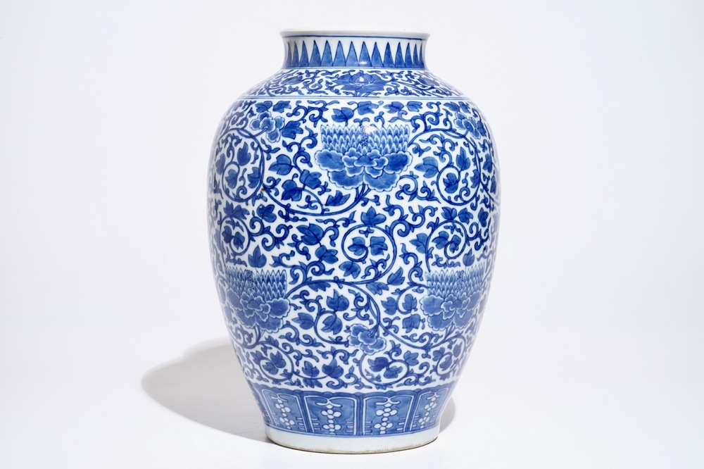 A Chinese blue and white peony scroll vase, 19th C.