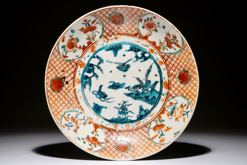 A Chinese Swatow charger with ducks in a pond, Ming