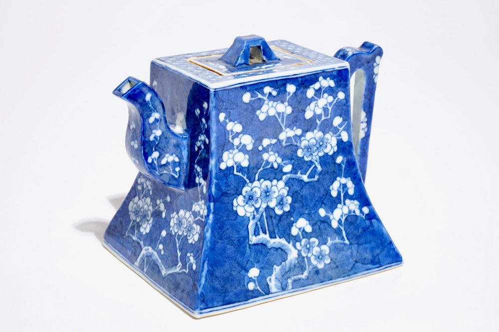 A Chinese blue and white &quot;prunus and ice&quot; teapot and cover, Kangxi mark, 19th C.