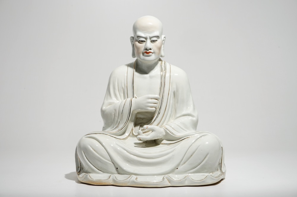 A large Chinese porcelain model of a seated Luohan, 20th C.