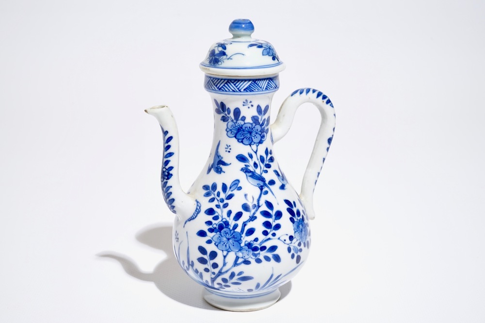 A Chinese blue and white covered jug with birds among flowers, Kangxi