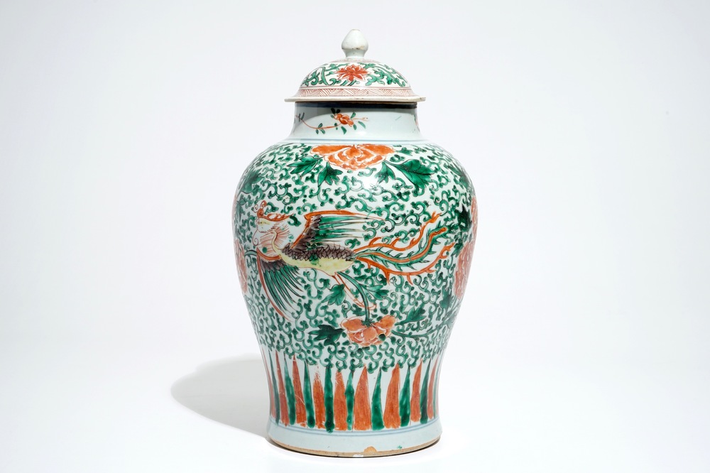 A Chinese wucai baluster vase and cover with phoenixes, Transitional period