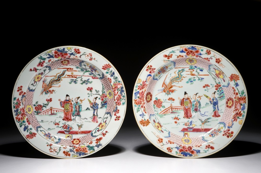 A pair of Chinese famille rose plates with figures and a phoenix, Yongzheng