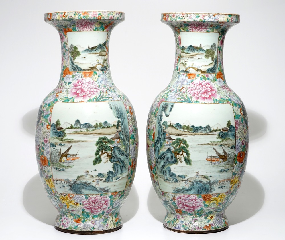 A large pair of Chinese famille rose millefleurs vases with landscape panels, Qianlong mark, 19th C.