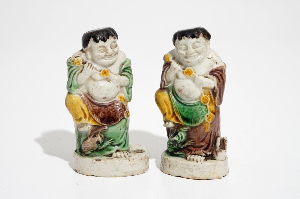A pair of Chinese verte biscuit models of Liu Hai with the toad, Kangxi