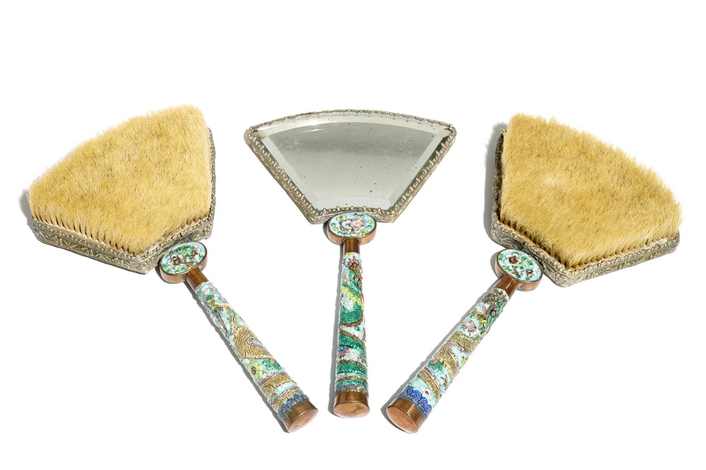 A Chinese enamelled silver and brass mirror and two brushes, 19/20th C.